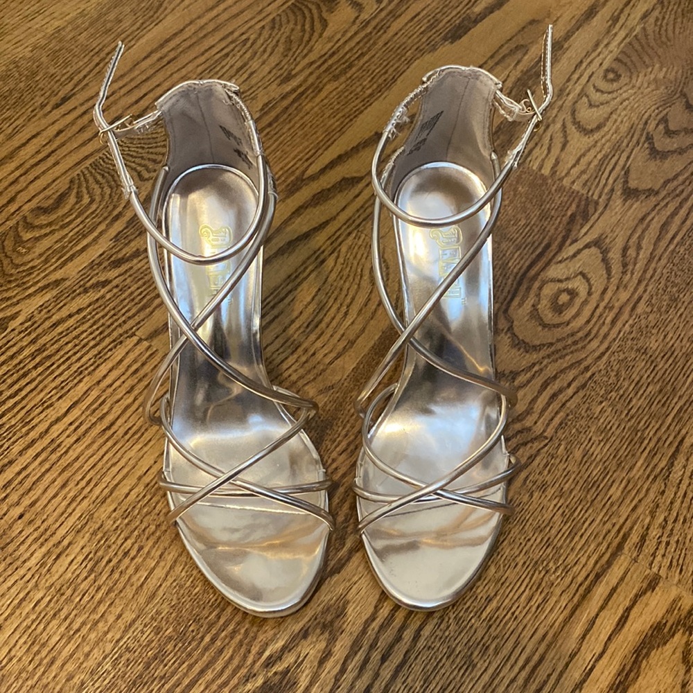 Rose gold heels. Never worn out.